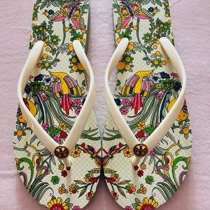 Tory Burch New Ivory/Promised Land Flip-Flops. Size 11. Never Worn.